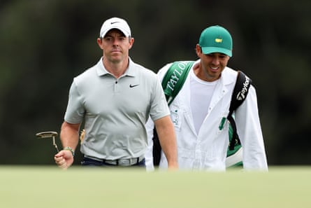 Rory McIlroy and caddie Harry Diamond walk up the 18th at last month’s Masters.