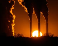 emissions rise from smokestacks