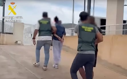Seen from behind in a still from a police video
