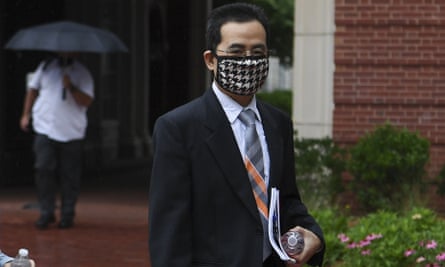 Anming Hu enters the Howard H. Baker, Jr. United States Courthouse in downtown Knoxville, Monday, June 7, 2021
