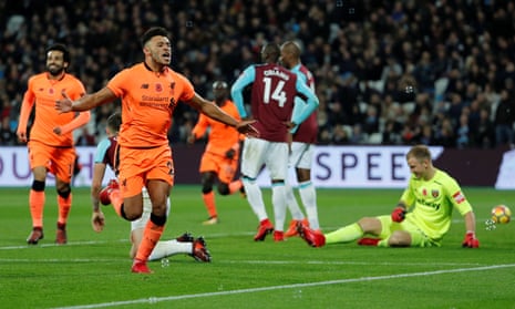 Liverpool’s Alex Oxlade-Chamberlain celebrates scoring their third goal.