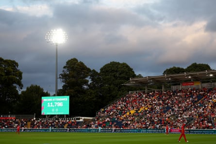 View of packed stand at Sophia Gardens next to scoreboard displaying record crowd figure