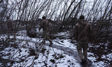 Ukrainian soldiers on patrol in the Sumy region on New Year’s Eve.