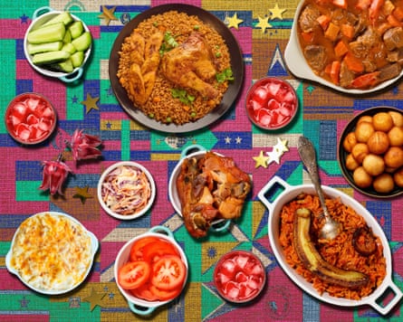 A diasporic Christmas spread: puff puff, jollof rice and chicken, mac and cheese, hibiscus and other sides.