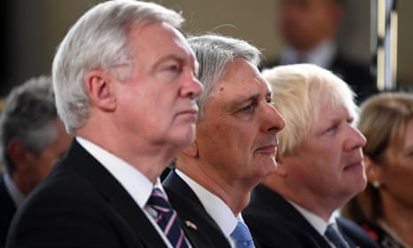 David Davis, Philip Hammond and Boris Johnson look serious