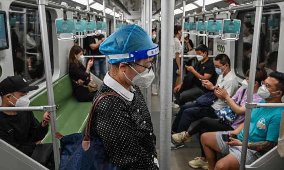 People travel on a subway in the Jing'an district of Shanghai after the end of Covid lockdown
