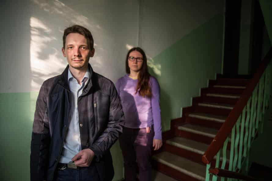 Nikolai Kanchov, who stood in the recent municipal elections for the opposition party Yabloko, and resident Anastasia inside one of the condemned flats in the Metrogorodsky District.