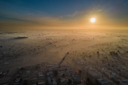 Pollution seen from above over Mexico, with the sun in the distance