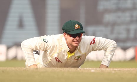 Steve Smith lying on the pitch