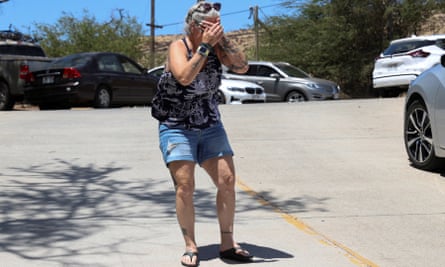 Steff Baku-Kirkman reacts after hearing reports that her home was destroyed along with her pets in the wildfires on Maui.