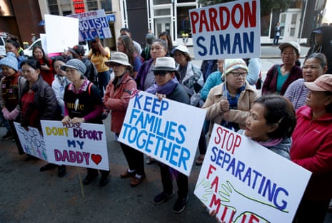 Demonstrators gather in front of Immigration and Customs Enforcement offices on Sansome Street in San Francisco, California.