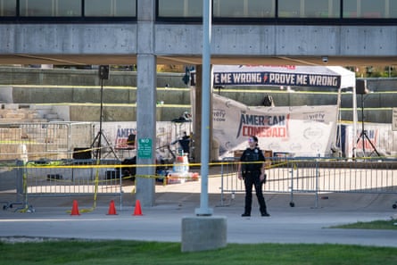 A police officer stands in the courtyard where Charlie Kirk was shot dead at Utah Valley University in Orem, Utah.