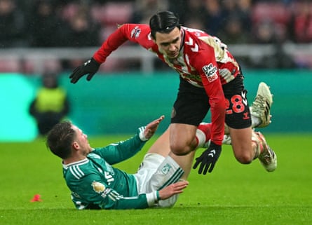 Enzo Le Fée tangles with Alexis Mac Allister.