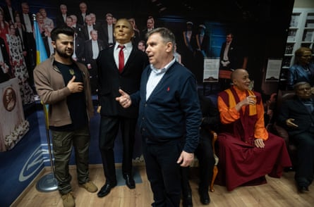 Marian Dreszer, owner of the Polonia Wax Museum in Kraków, pictured among some of the waxworks.