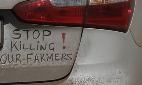 A bumper sign calls for the end of farm killings in South Africa, during a blockade of a freeway in Midvaal, South Africa. 