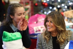 London, UK. US First Lady Melania Trump visits a Salvation Army centre in Clapton where she met local school children, made Christmas decorations and helped wrap donated presents