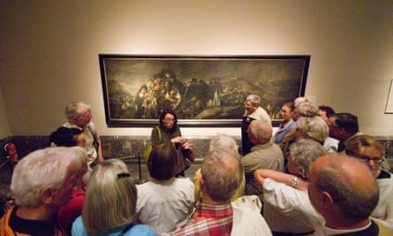 Strange encounter … a guide initiates another Prado tour group in the Black Paintings.