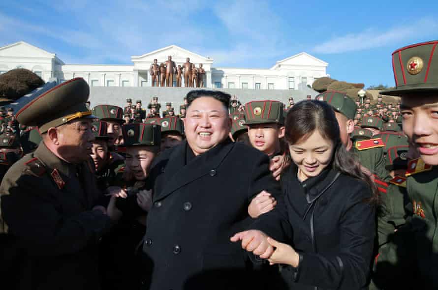 Kim and his wife Ri Sol-Ju visit the Mangyongdae Revolutionary School in Pyongyang to plant trees with its students