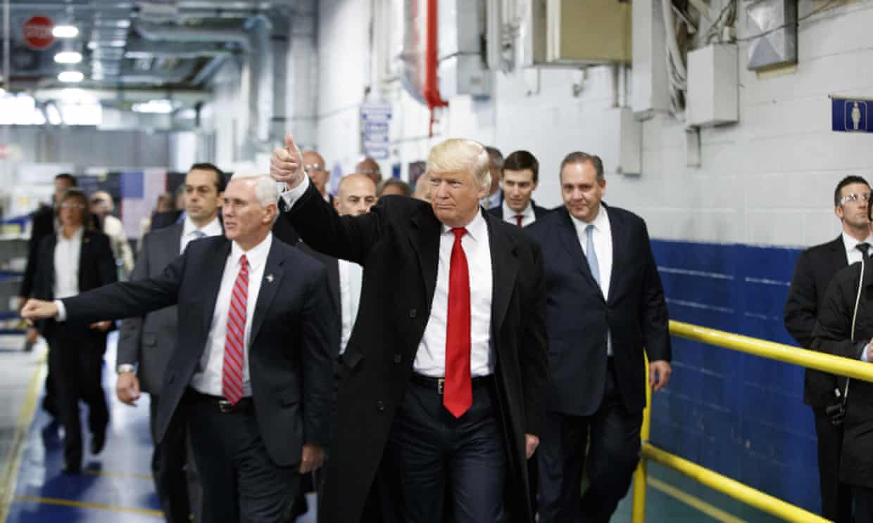 Donald Trump and Mike Pence visit a Carrier factory in December 2016.