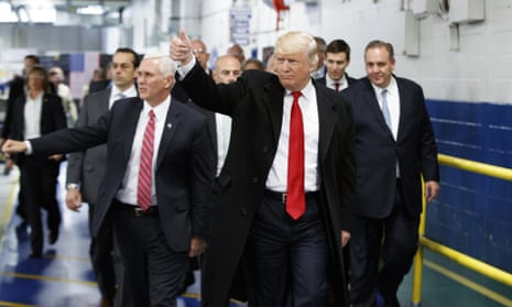 President-elect Donald Trump and Vice President-elect Mike Pence wave as they visit a Carrier factory in December 2016, in Indianapolis, Indiana. 