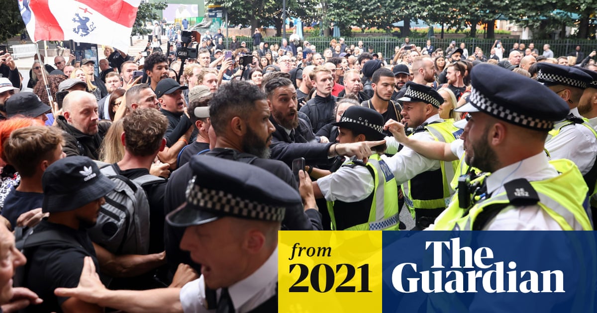 Anti-vaccine protesters try to...