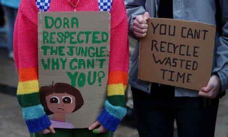 People hold placards at a global youth climate strike in Belfast before the UN Cop26 climate talks in Glasgow last year.