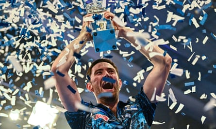 Luke Humphries celebrates winning the 2023 World Grand Prix