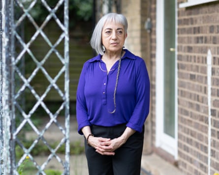 Diana Defries wearing a purple shirt