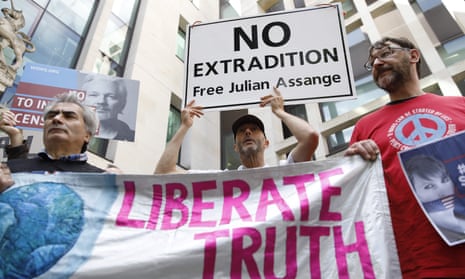Supporters of Julian Assange protest outside London’s Westminster magistrates court.