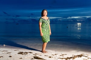 Tapua Pasuna, 24, crowned as ‘Miss Tuvalu’, poses on the beach next to Funafuti lagoon