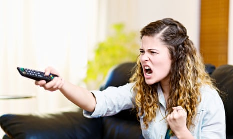 ‘Good actors give us a focal point, right in our homes, to vent our anxiety.’ A woman shouts at the TV, posed by model.