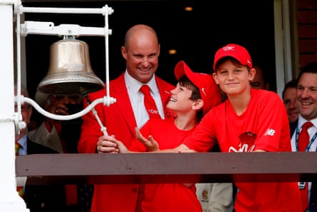 Strauss with Luca (left) and Sam dressed in red for the Ruth Strauss Foundation while ringing the five-minute bell during an Ashes Test at Lord’s in 2019.