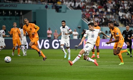 Christian Pulisic of the USA plays a pass during the match against the Netherlands