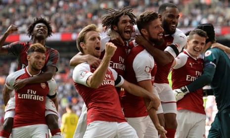 Arsenal players celebrate.