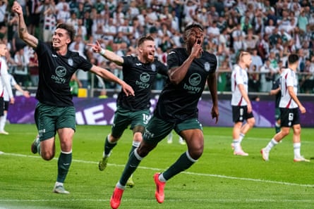 Miguel Chaiwa celebrates a Hibs extremity successful their amazingly cleanable mixed kit – but they yet mislaid 5-4 connected aggregate to Legia Warsaw aft other time.
