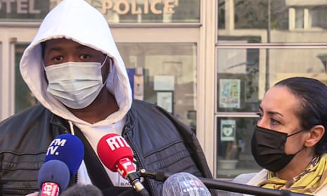 French music producer Michel Zecler talks to the media outside French police headquarters as he arrives to press charges on 26 November. 