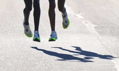 Kenya's Judith Jeptum Korir and Ethiopia's Gotytom Gebreslase shoes during a 2023 marathon in Eugene, Oregon