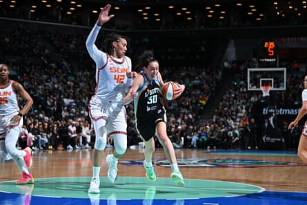 Breanna Stewart, wearing a New York Liberty uniform paying homage to the franchise’s early years, drives to the basket during Friday night’s game against the Connecticut Sun.