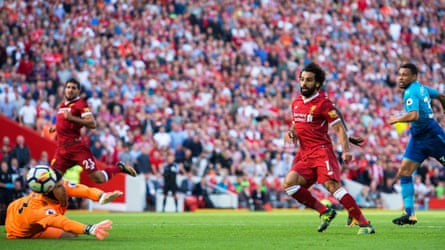 Mohamed Salah places the ball past Petr Cech to put Liverpool 3-0 up against Arsenal at Anfield in August 2017 and having gone on a thrilling run that started in his own half