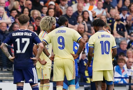 Curacao's Jurgen Locadia receives a red card during an international friendly match at Hampden Park
