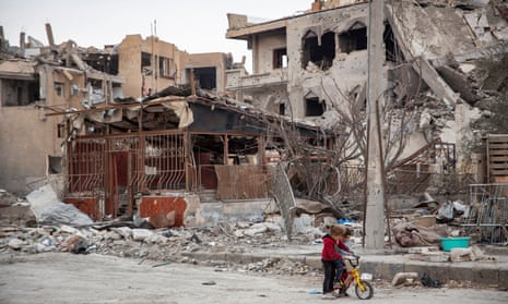 Syria conflictAmnesty International handout photo dated 02/2018 of children riding a bicycle next to destroyed buildings in Raqqa, Syria. The US-led coalition campaign to liberate the city from the clutches of Islamic State killed hundreds of civilians and injured thousands, the charity has claimed. PRESS ASSOCIATION Photo. Issue date: Tuesday June 5, 2018. See PA story DEFENCE Raqqa. Photo credit should read: Amnesty International/PA Wire NOTE TO EDITORS: This handout photo may only be used in for editorial reporting purposes for the contemporaneous illustration of events, things or the people in the image or facts mentioned in the caption. Reuse of the picture may require further permission from the copyright holder.