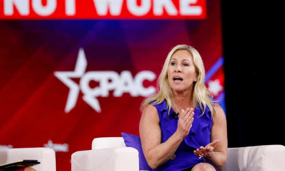 Marjorie Taylor Greene at CPAC, the conference summit taking place at the same time in Orlando.