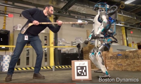 Atlas, the Boston Dynamics robot, being hit with a hockey stick.
