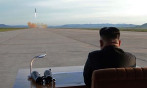 North Korean leader Kim Jong-un inspects a missile launch in this undated image. China has urged the US to stop threatening Pyongyang.