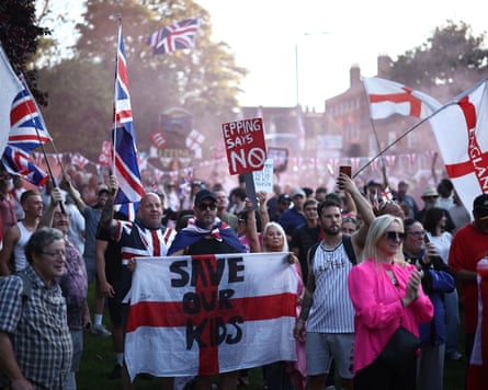 Protesters calling for the closure of the The Bell Hotel, believed to be housing asylum seekers, gather outside the council offices in Epping