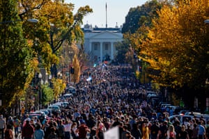 People celebrate on Black Lives Matter plaza across from the White House in Washington DC on 7 November.