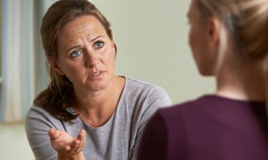 Mature Woman Discussing Problems With Counselor