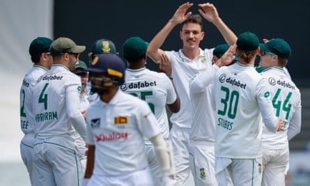 Marco Jansen celebrates with teammates after the dismissal of Sri Lanka’s Dinesh Chandimal