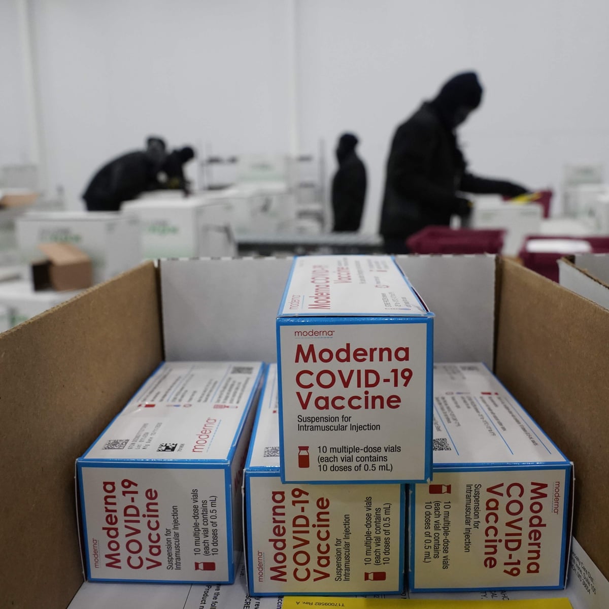 Moderna vaccine shipments begin as US reels under Covid surge | World news | The Guardian