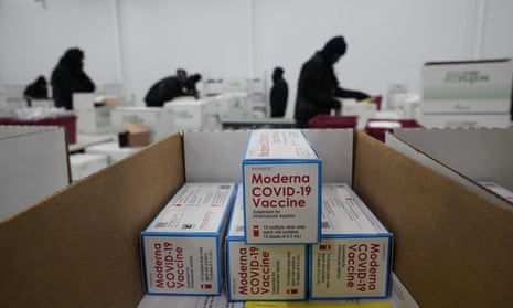 Boxes containing the Moderna Covid-19 vaccine are prepared to be shipped at the McKesson distribution center in Olive Branch, Mississippi, on Sunday.